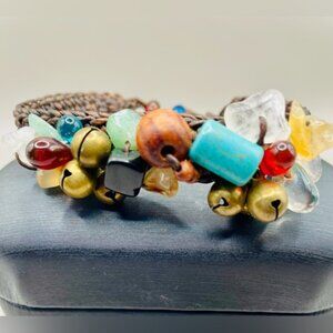 Multi color stone chips on woven leather bracelet. 8 inches long. Chunky. Boho